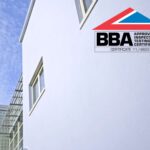 Rendered building with blue colour finish to exterior and windows, blue and BBA certification overlayed on image