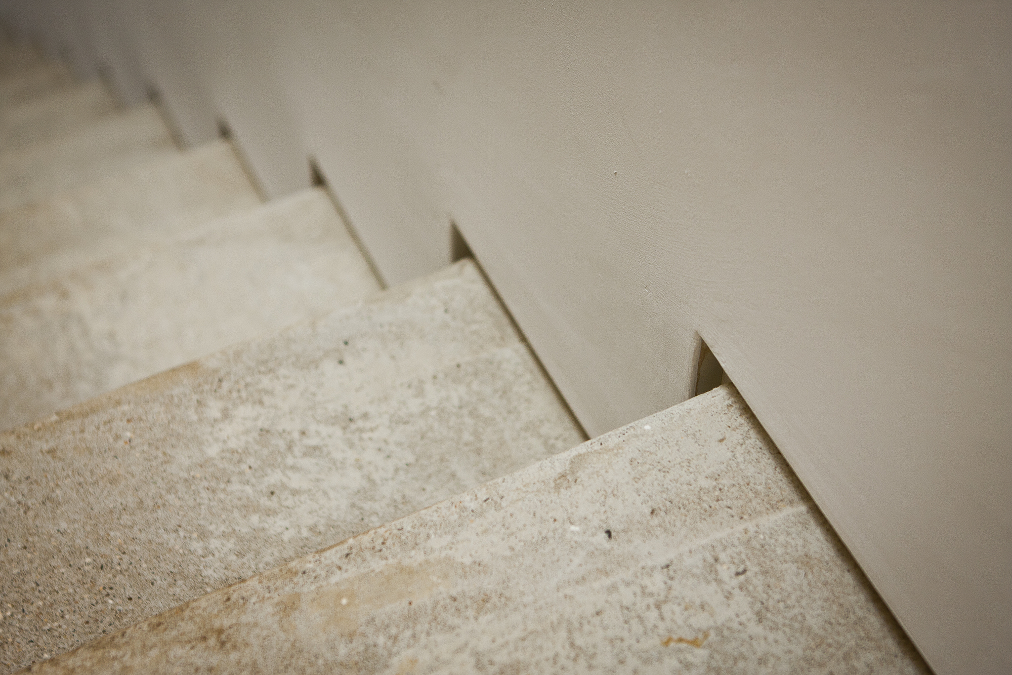 Close up high resolution image of stairs with high quality shadow gap bead with plaster finish