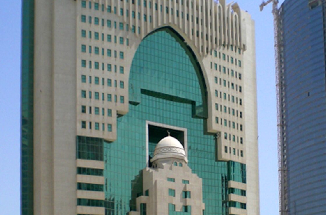 Exterior of Awqaf tower doha and render finish using PVCu beading, blue sky surrounding building