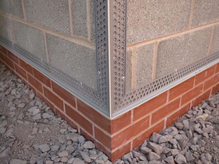Close up corner structure of brick and block work, PVCu render beading on angles